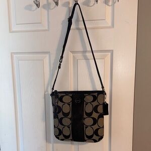 Coach Signature Stripe canvas crossbody bag with black leather trim